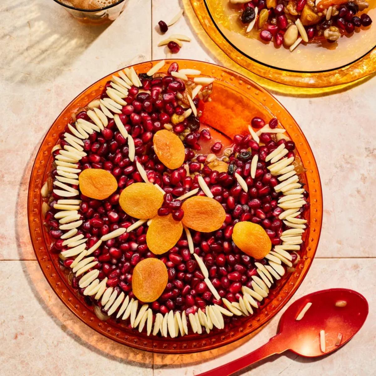 A bowl of traditional Armenian Anoushabour sweet pudding garnished with dried fruits and nuts, featured as one of the best Christmas desserts of Europe.
