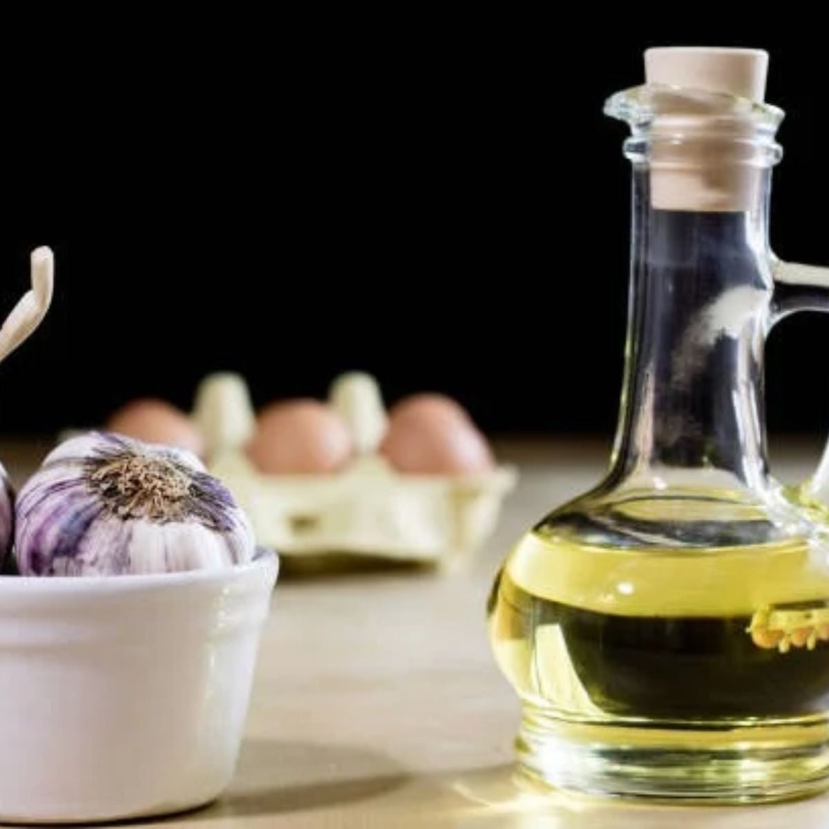 Garlic Oil in a glass jug like container on the counter