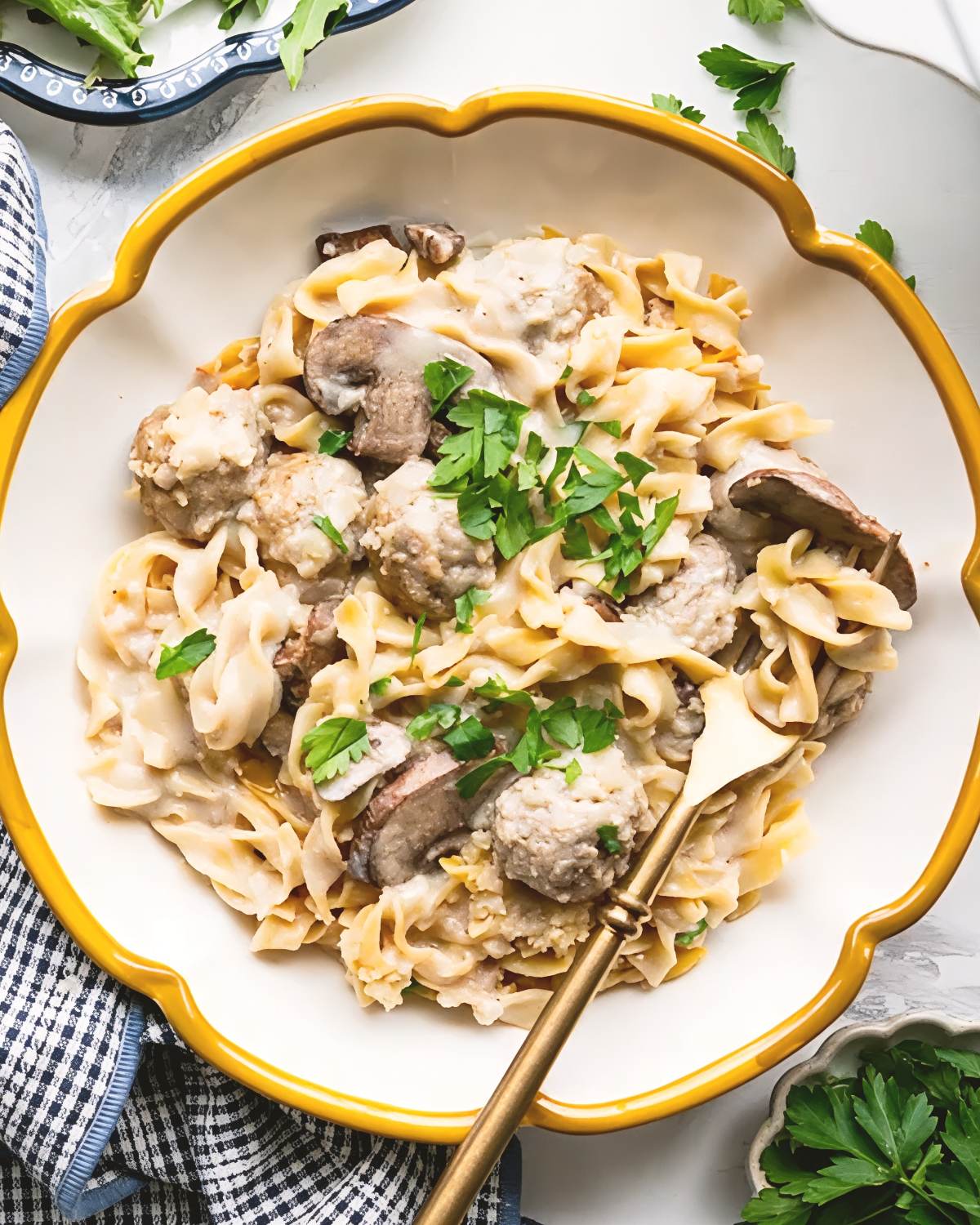Swedish meatball pasta bake with egg noodles and mushrooms, an easy dump and bake recipe for dinner