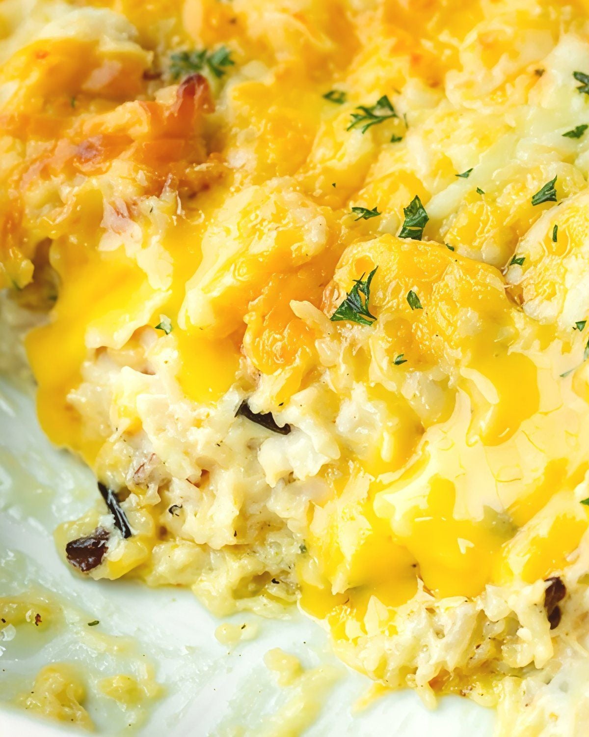 Cheesy angel chicken and rice casserole, a comforting dump and bake recipe for dinner.