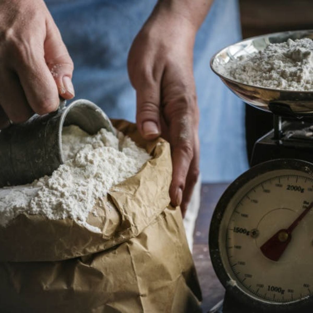 A measuring cup used to lift flour directly out of the bag