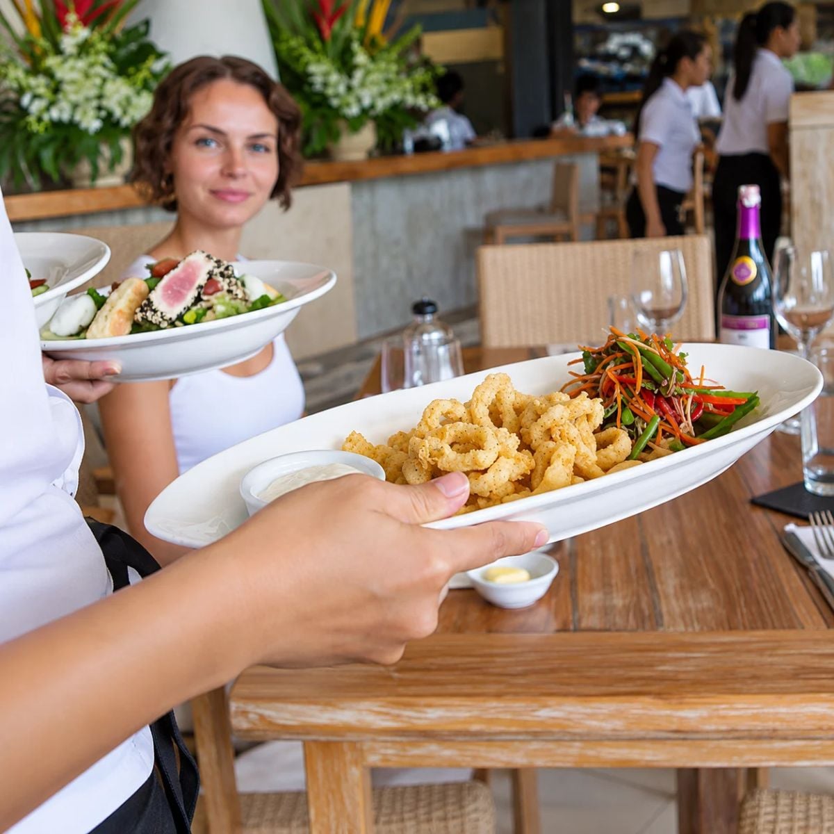 full plate handed across the counter