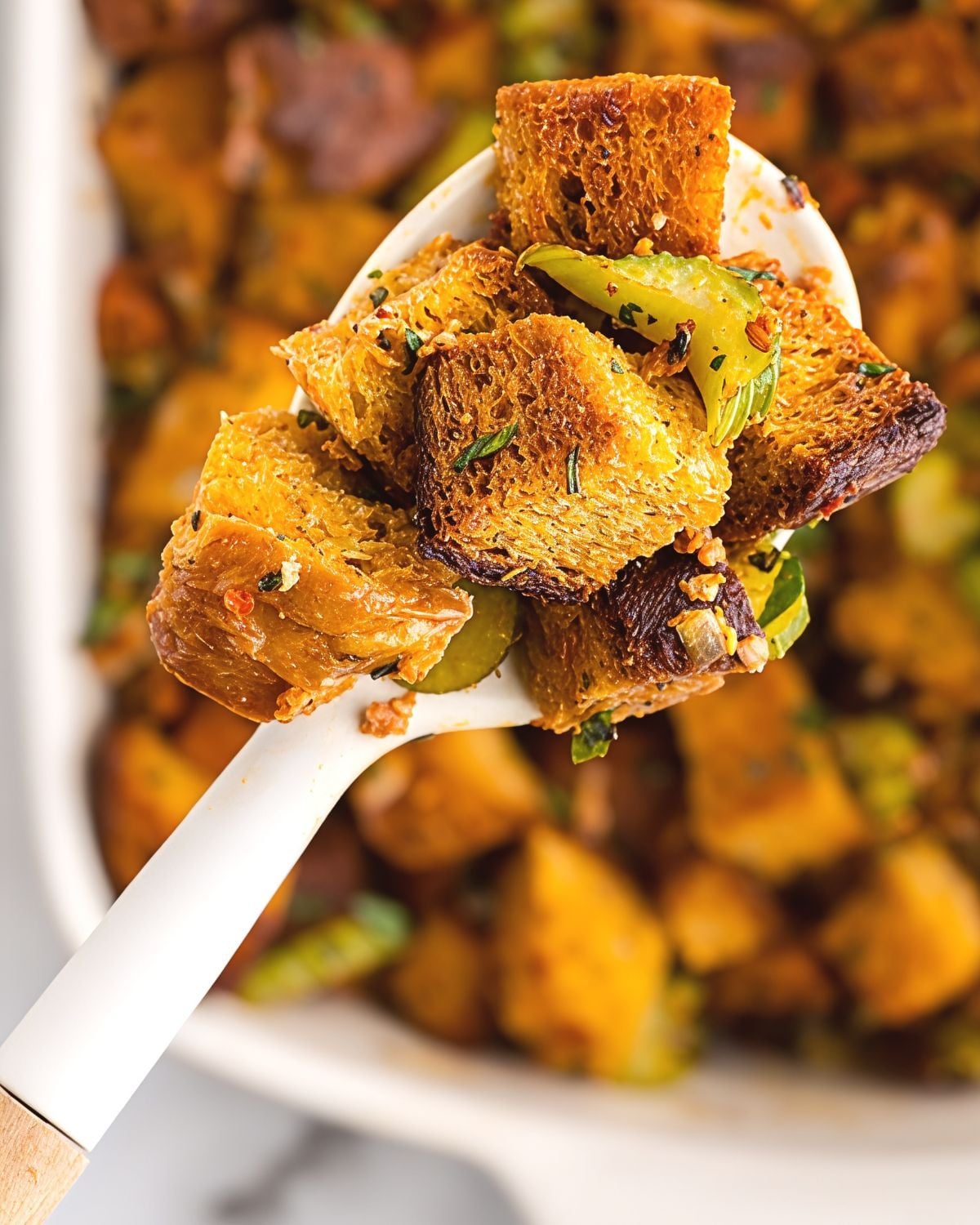A savory dish of low-carb keto sausage and herb stuffing baked to golden perfection, creating a comforting option for keto thanksgiving sides.