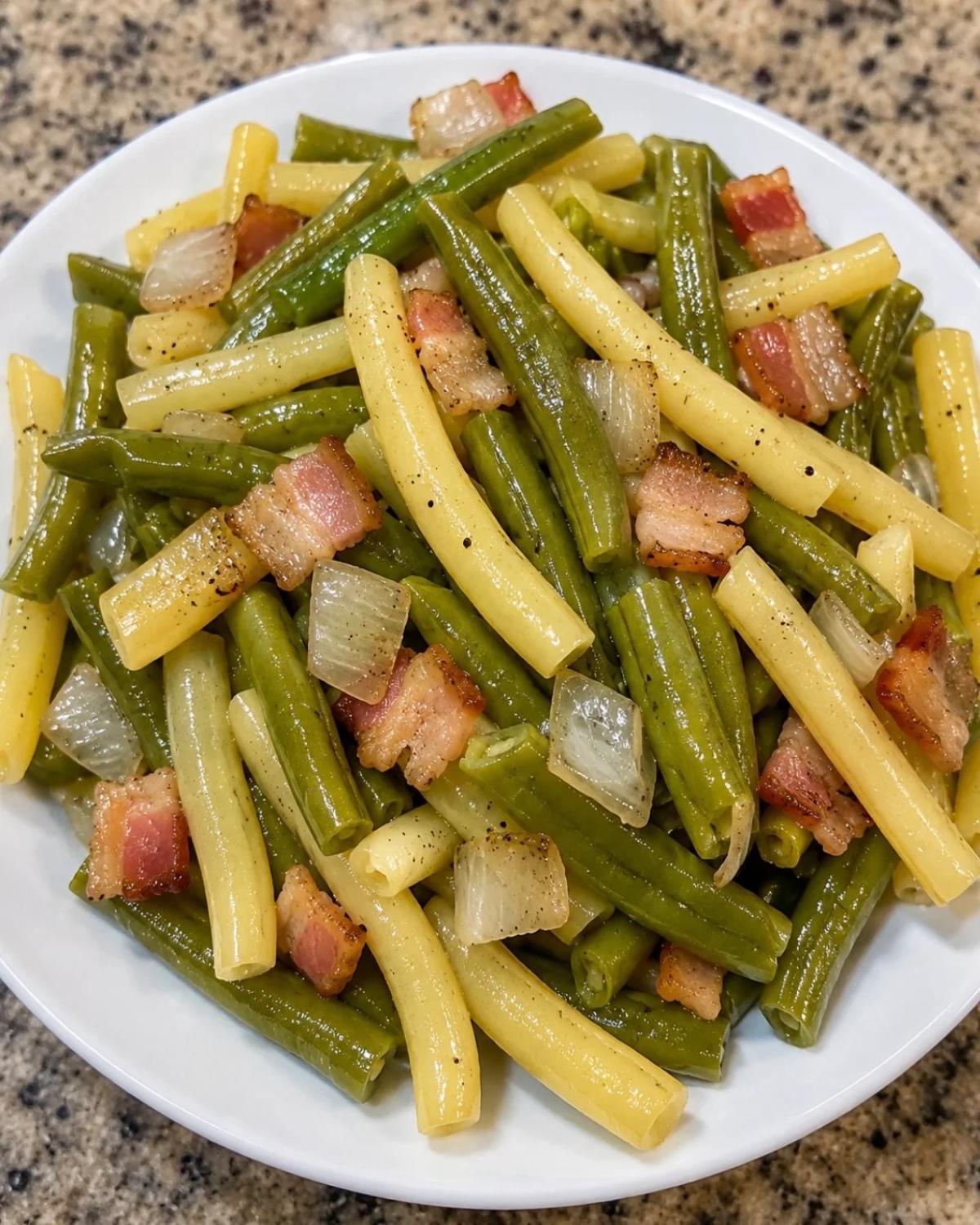 Southern green beans cooked with bacon and onions in a white bowl as a traditional Thanksgiving side dish